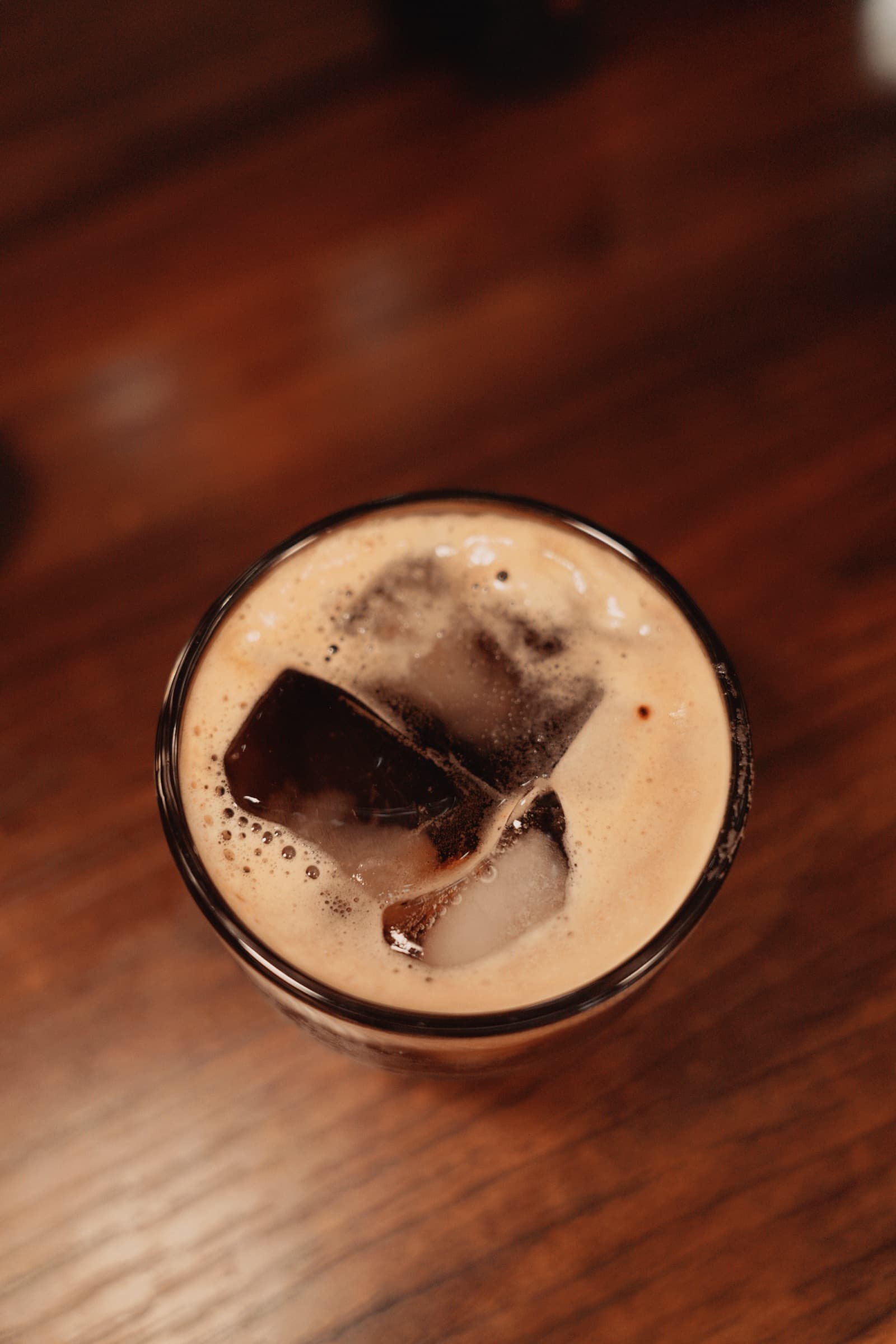 Top-down shot of a cappuccino dusted with cinnamon