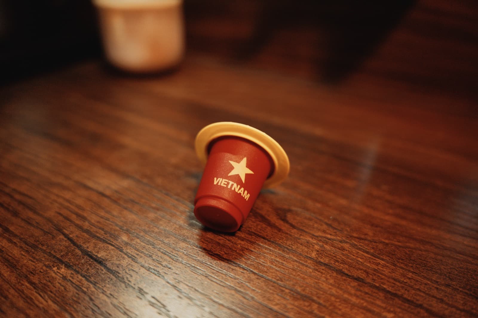 Vietnamese coffee pod on a wooden table